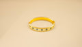 Gold Beaded Bangle With Blue Floral Accents